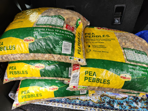 pea pebble bags in trunk